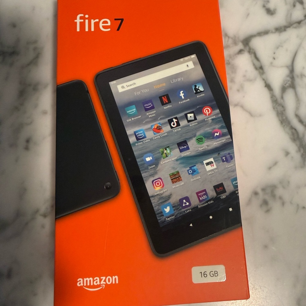 New in box- Amazon Fire 7 Tablet - Black with case and screen protector.